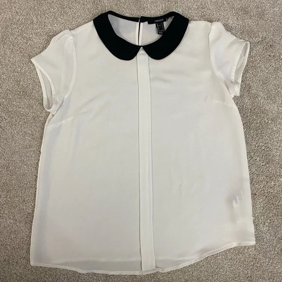 white sleeveless blouse with peter pan collar